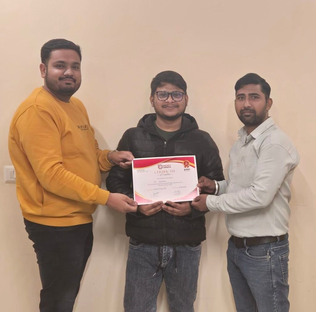 Student receiving digital marketing course certificate from Rocket Growth